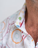 Close-up of a colourful patterned fabric with a blurred background