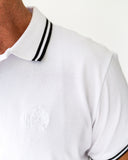 White polo shirt with black trim and John Lennon embroidered motif